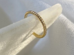 Win a Maison Tjoeng 18K yellow gold ear cuff featuring 36 white diamonds
