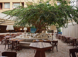 Win a NYE Experience for You and 3 Friends at Olympus Dining